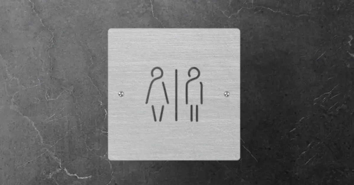 Premium matte black ACM toilet sign on corporate office door
